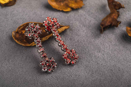SILVER FLORAL GARNET DANGLER